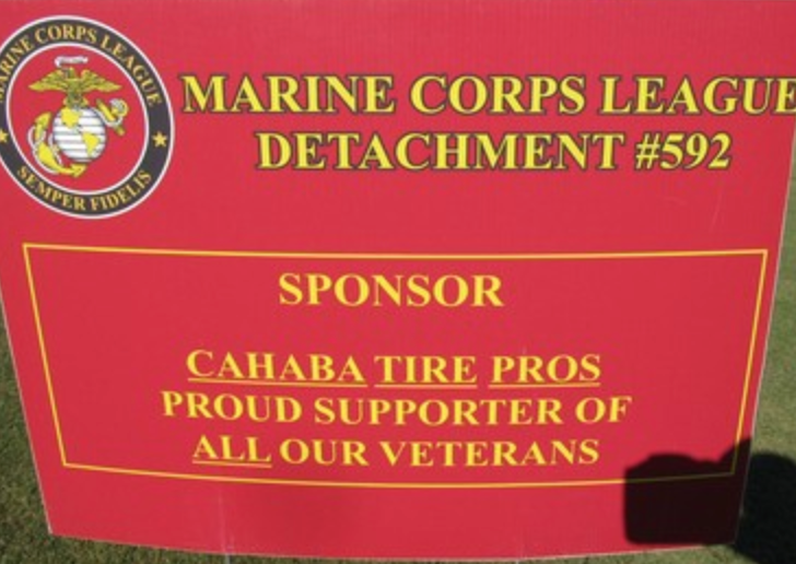Sponsor sign for Cahaba Tire Pros, proud supporter of all veterans