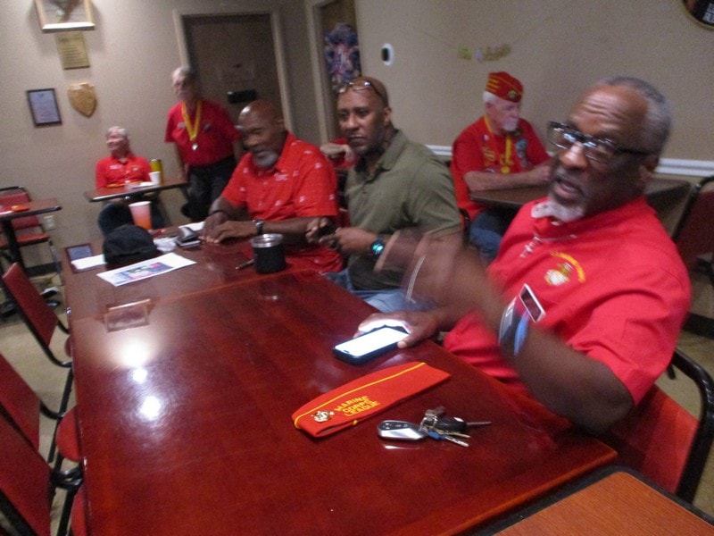 Members meeting around conference table