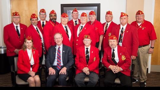 Birmingham Marines group photo in red blazers and formal attire